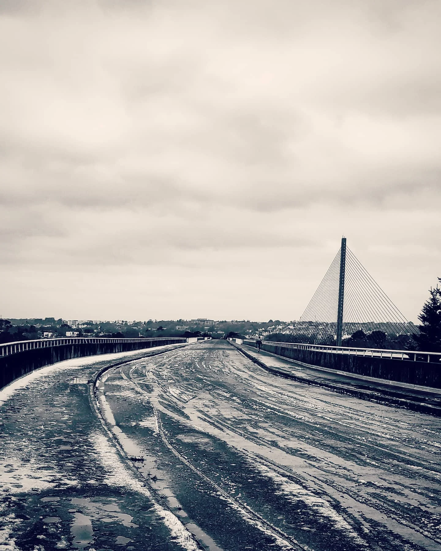 Photo 1 from Benjamin Simier’s Instagram post: A snowy bridge in Bretagne, France 🌨️❄️🌨️🌨️❄️