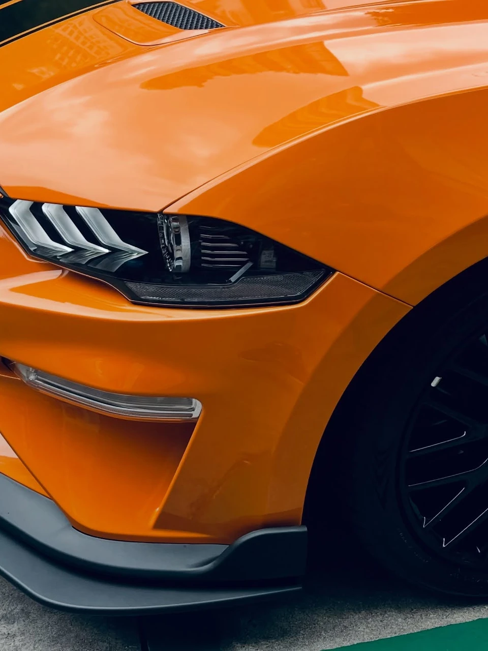 Photo 1 from Benjamin Simier’s Instagram post: A very beautiful Orange Ford Mustang GT 😍🚗