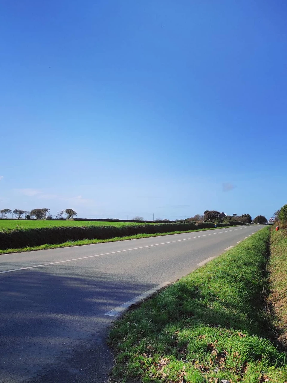 Photo 1 from Benjamin Simier’s Instagram post: Alone on the road under the blue sky 🛣️