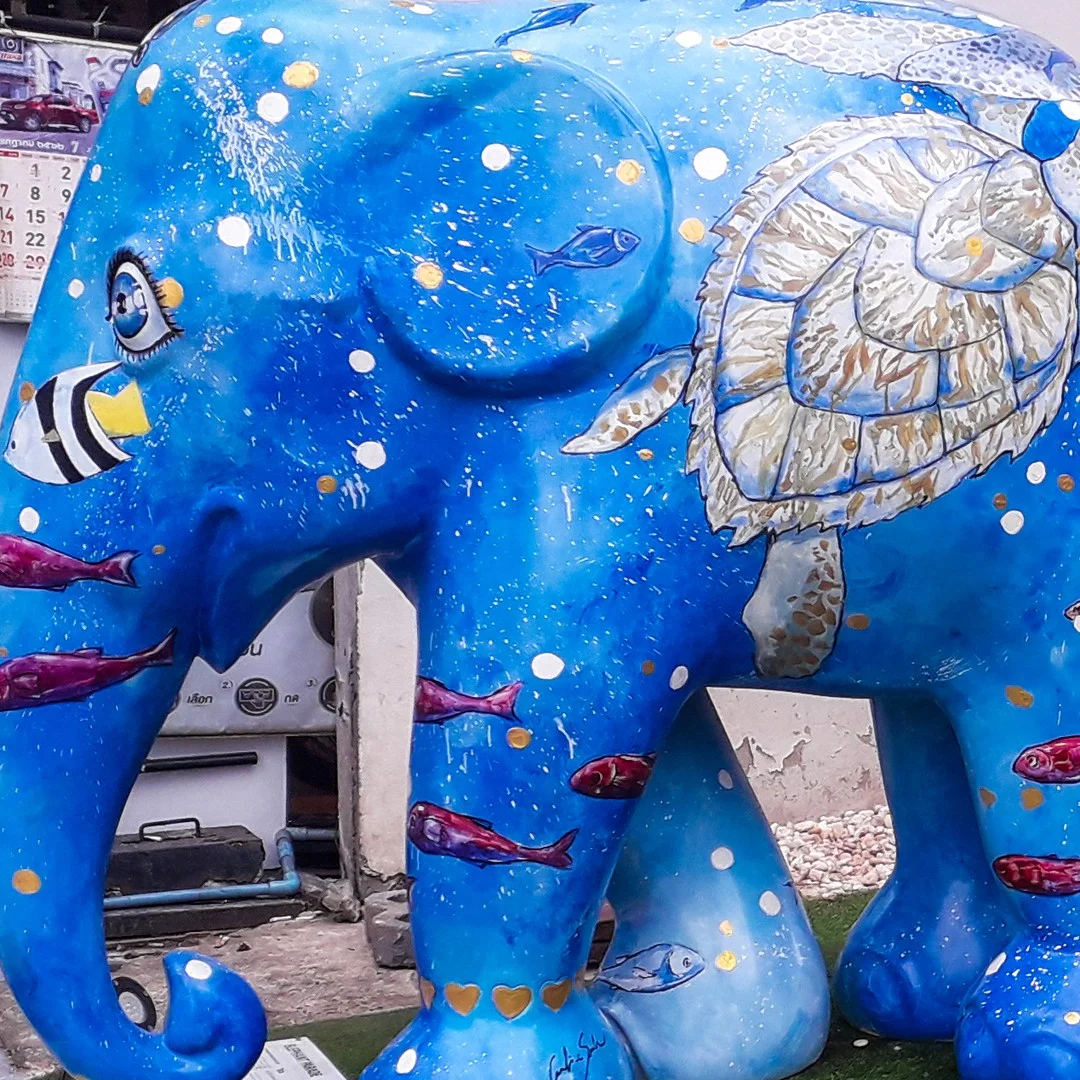 Photo 1 from Benjamin Simier’s Instagram post: Blue elephant handcrafted in Chiang Mai, Thailand 🇹🇭🇹🇭20% of Elephant Parade profits are donated to elephant protection and welfare projects. 🐘🐘 Visit : www.ele