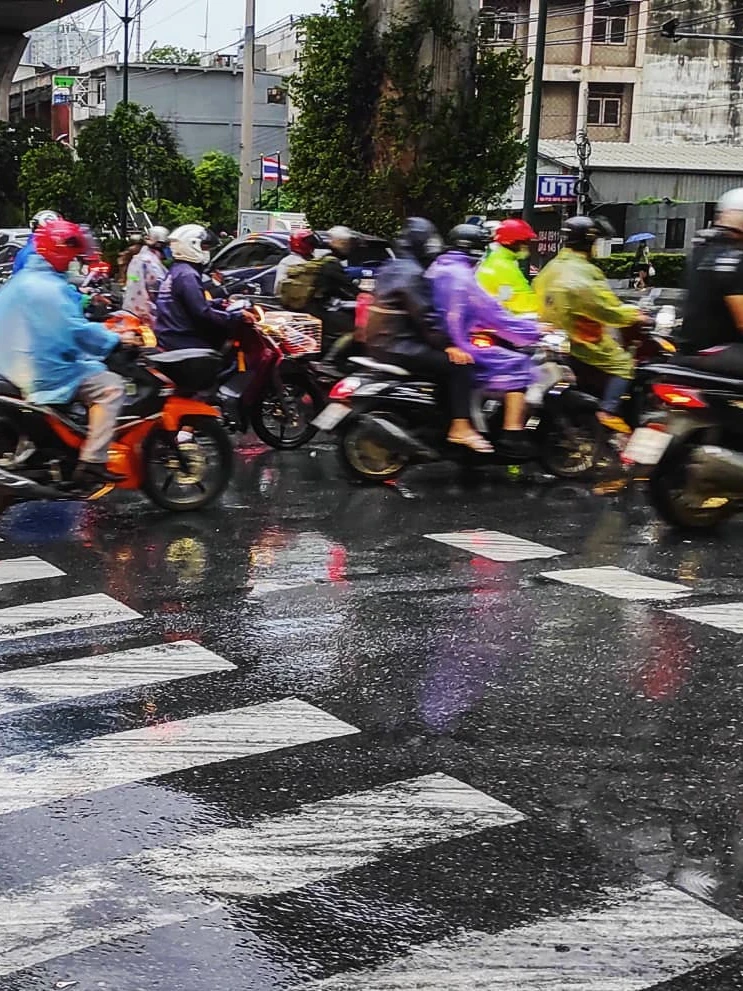 Photo 1 from Benjamin Simier’s Instagram post: Bangkok under the rain 🌧️☔