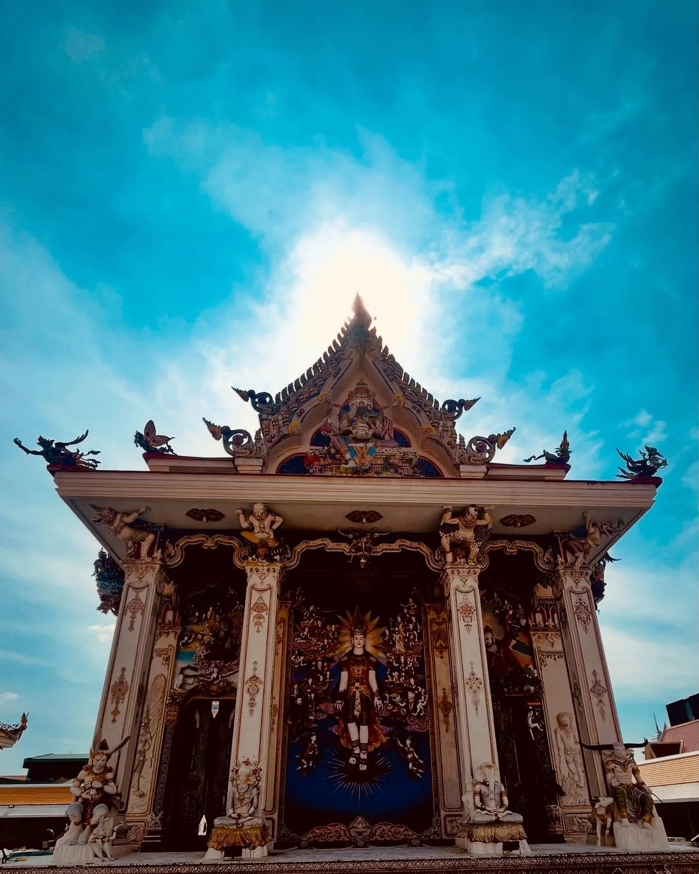 A Thai temple beneath a bright sky