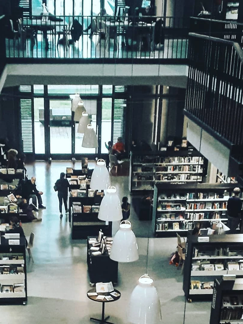 Photo 1 from Benjamin Simier’s Instagram post: Working atmosphere at the library