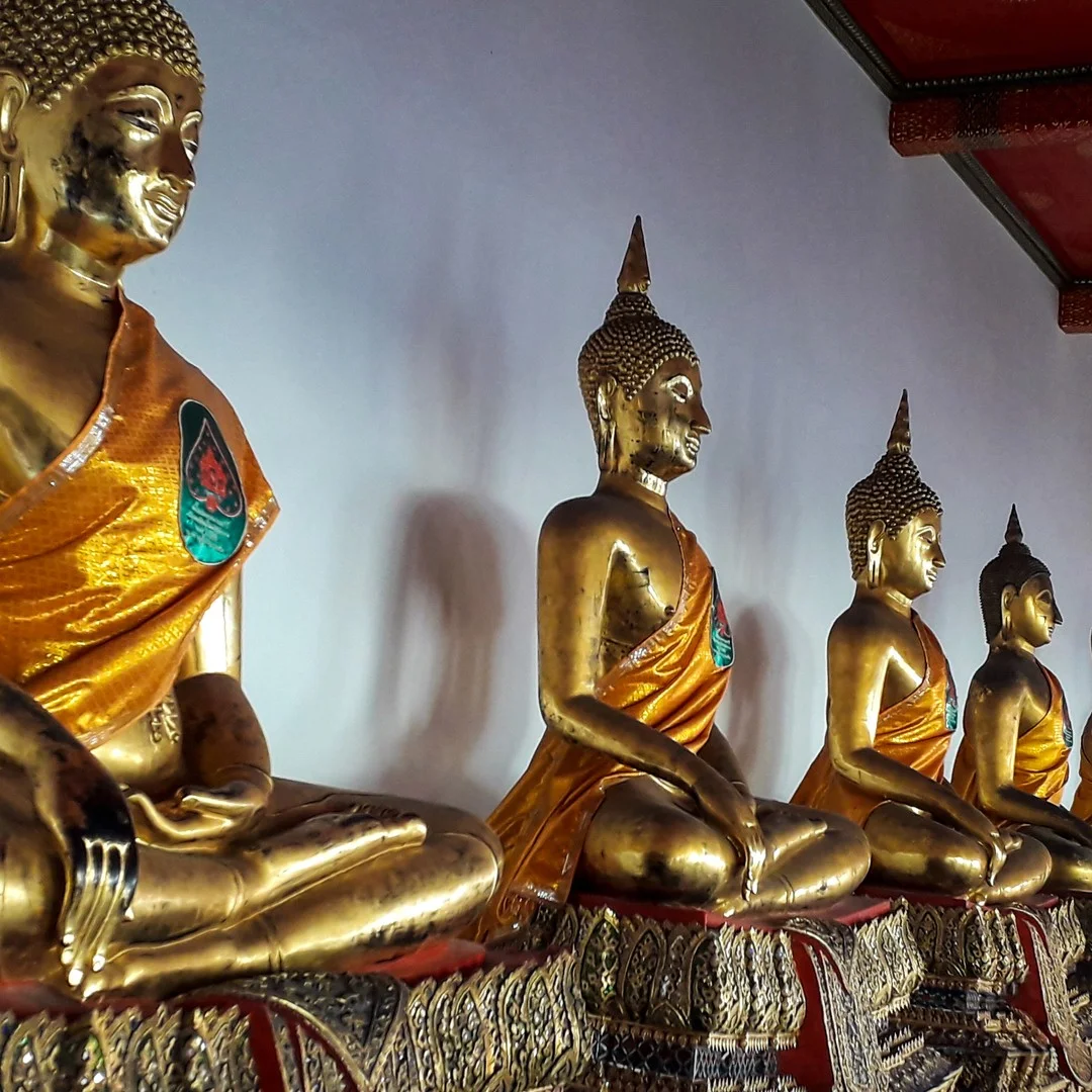 Photo 1 from Benjamin Simier’s Instagram post: Buddha statues at Wat Pho in Bangkok in Thailand 🇹🇭🇹🇭🙏