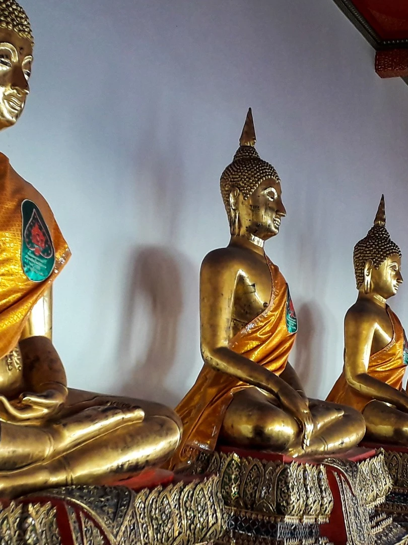 Photo 1 from Benjamin Simier’s Instagram post: Buddha statues at Wat Pho in Bangkok in Thailand 🇹🇭🇹🇭🙏