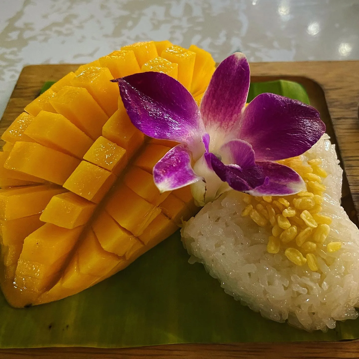 Photo 1 from Benjamin Simier’s Instagram post: Mango sticky rice 🥭