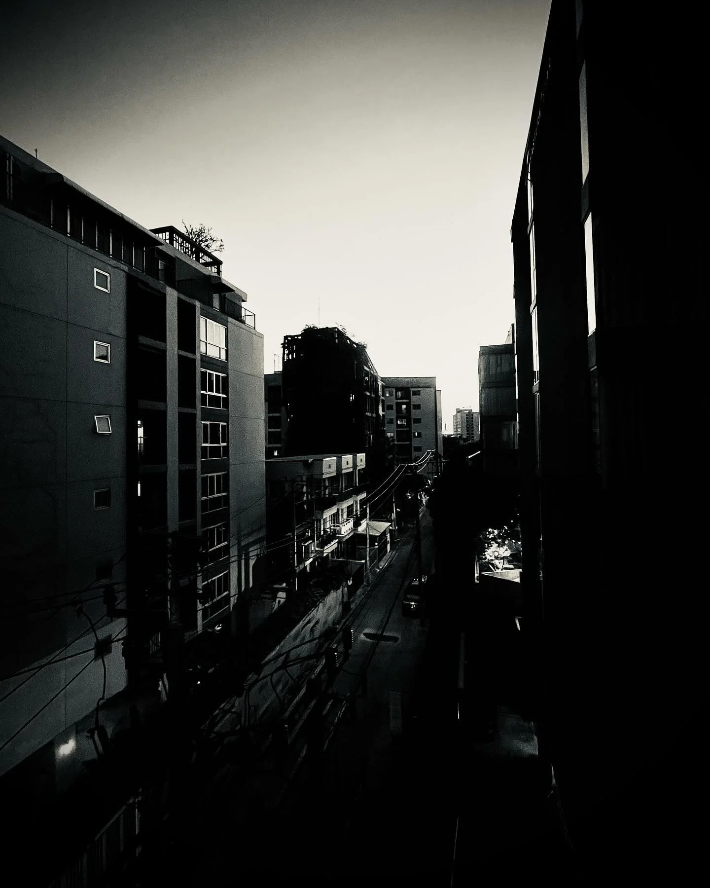 Photo 1 from Benjamin Simier’s Instagram post: The shadows are getting longer, but the city’s still lit up. 🌆