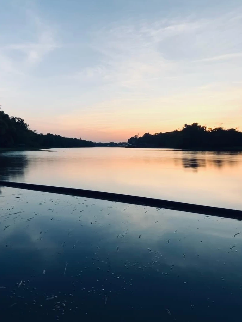 Photo 1 from Benjamin Simier’s Instagram post: Sunset bliss on the banks of the lake in Uthai Thani. Thailand’s magic never disappoints. ✨🇹🇭