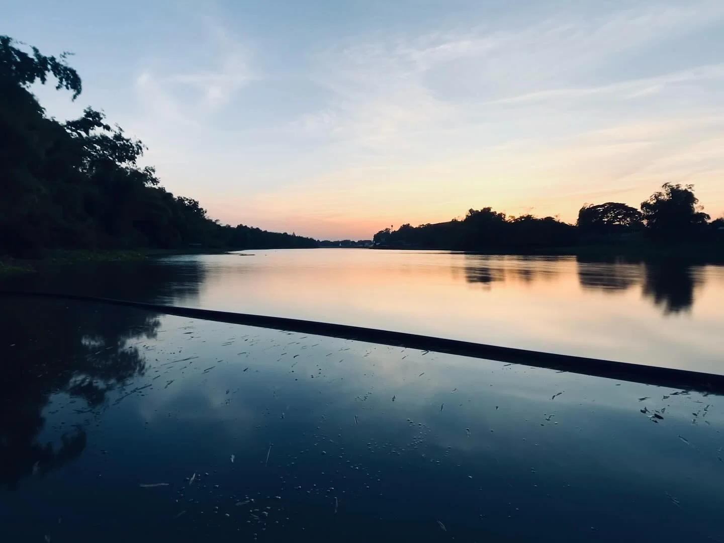 Photo 1 from Benjamin Simier’s Instagram post: Sunset bliss on the banks of the lake in Uthai Thani. Thailand’s magic never disappoints. ✨🇹🇭