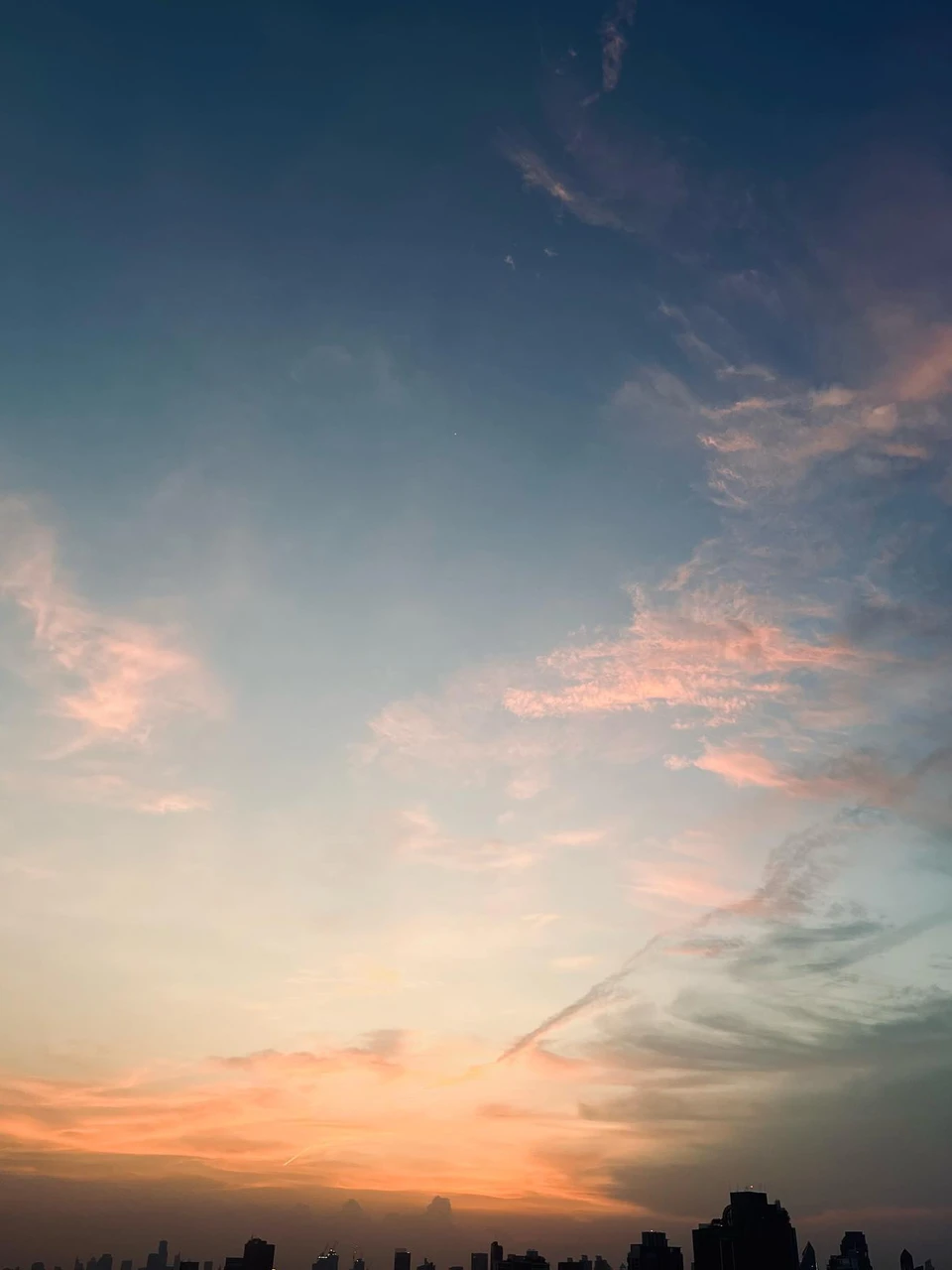 Photo 1 from Benjamin Simier’s Instagram post: Under this amazing sky, the buildings seems too small 🏠