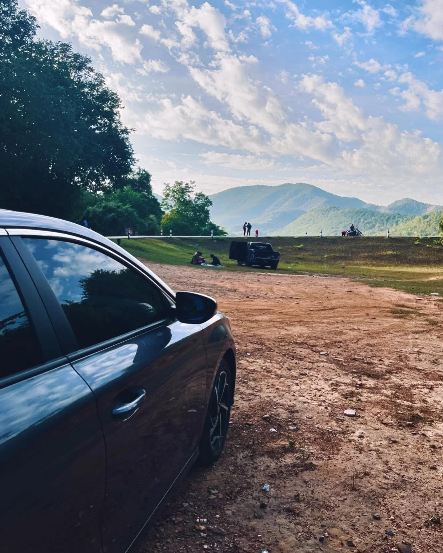 Photo 1 from Benjamin Simier’s Instagram post: The road less traveled often leads to the most breathtaking views. 🇹🇭✨ Took this pic during my road trip through Sukothai, and I’m still in awe of the lush gree