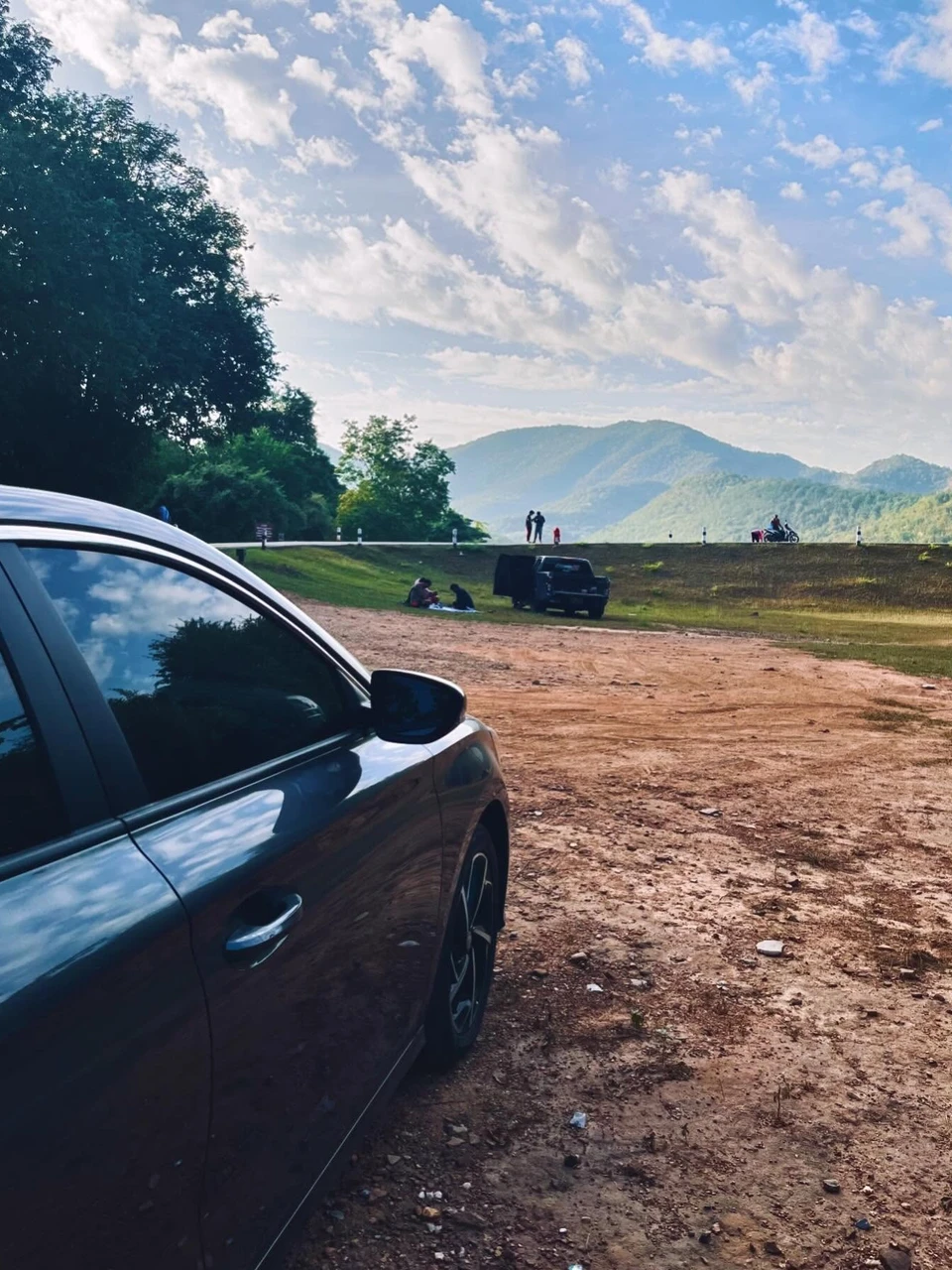 Photo 1 from Benjamin Simier’s Instagram post: The road less traveled often leads to the most breathtaking views. 🇹🇭✨ Took this pic during my road trip through Sukothai, and I’m still in awe of the lush gree