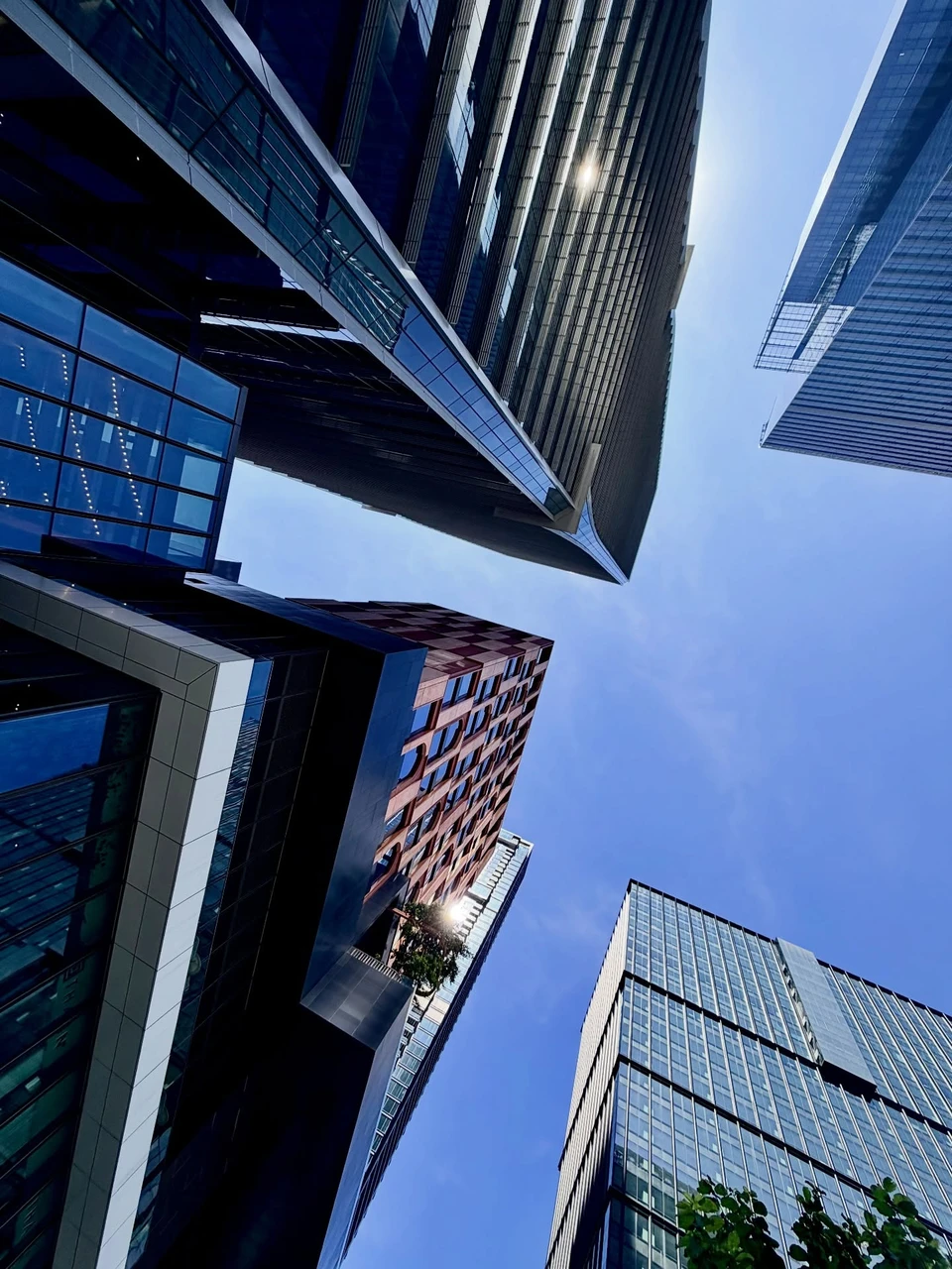 Photo 1 from Benjamin Simier’s Instagram post: Bangkok building under a beautiful blue sky
