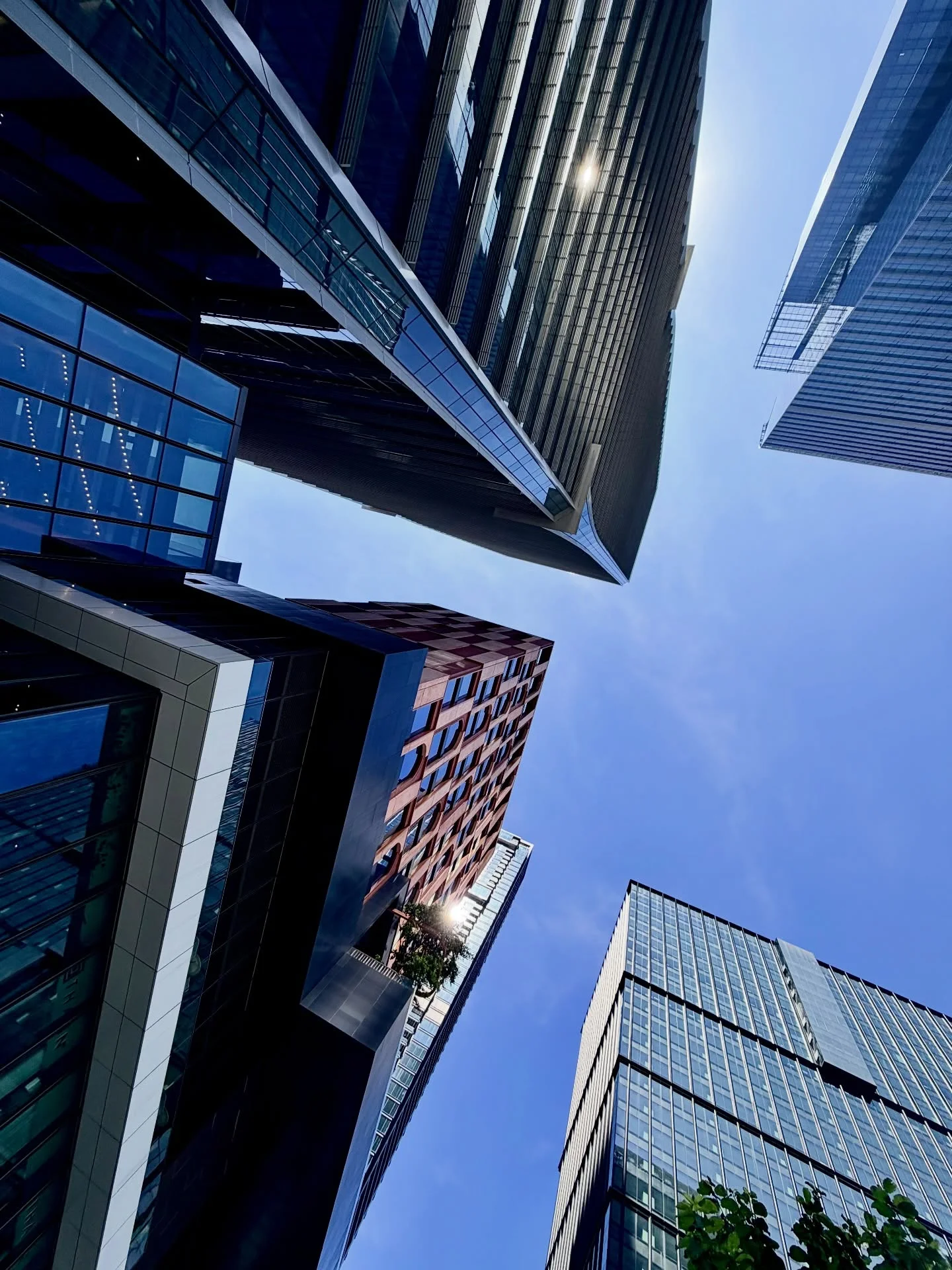 Photo 1 from Benjamin Simier’s Instagram post: Bangkok building under a beautiful blue sky