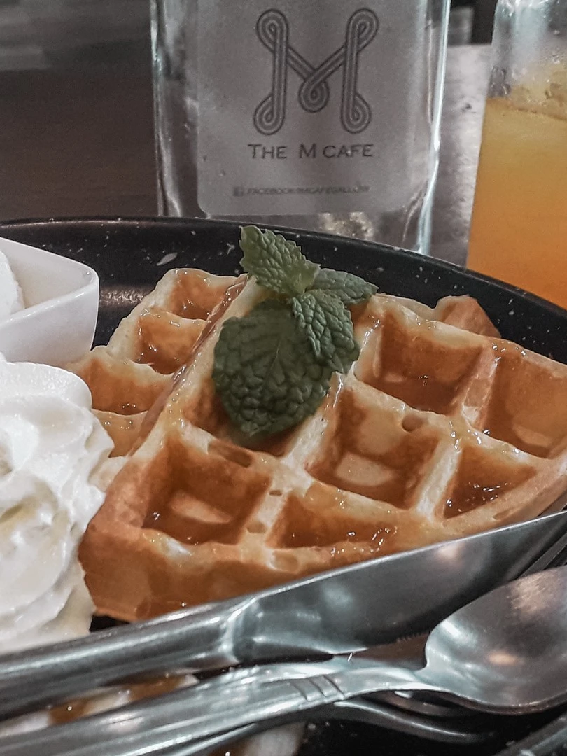 Photo 1 from Benjamin Simier’s Instagram post: Waffle and ice cream at The M Cafe at Bangkok in Thailand 🇹🇭🇹🇭 If you like Marvel universe, you have to visit imperative this place because they are a lot statu