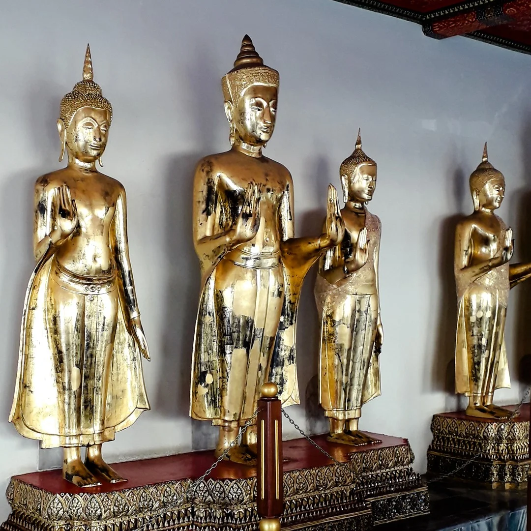 Photo 1 from Benjamin Simier’s Instagram post: Standing Buddha statues at Wat Pho in Bangkok in Thailand 🇹🇭🇹🇭 .