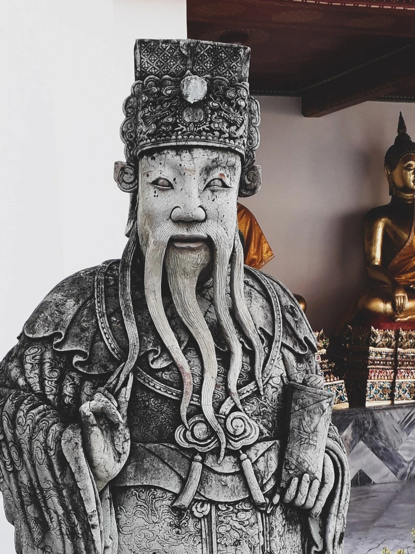 Photo 1 from Benjamin Simier’s Instagram post: Stone statue and Buddha of the temple Wat Pho (วัดโพธิ์) at Bangkok in Thailand 🇹🇭
