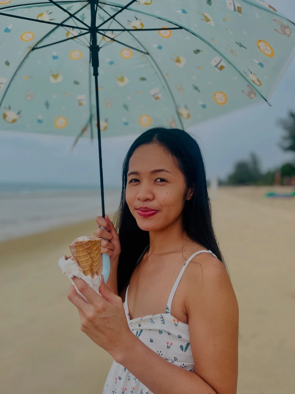 Photo 1 from Benjamin Simier’s Instagram post: Eating ice cream on the beach… under the rain 🍦 🏖️ ☔️