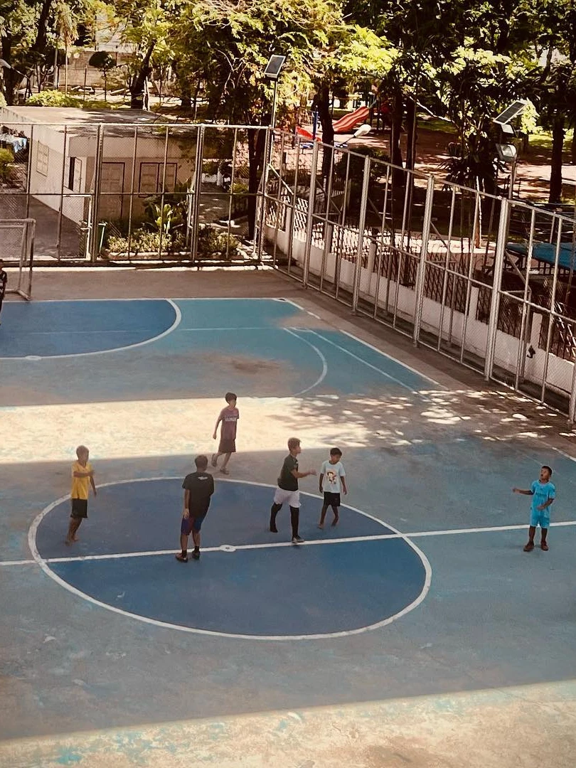 Photo 1 from Benjamin Simier’s Instagram post: Children play football at Bangkok