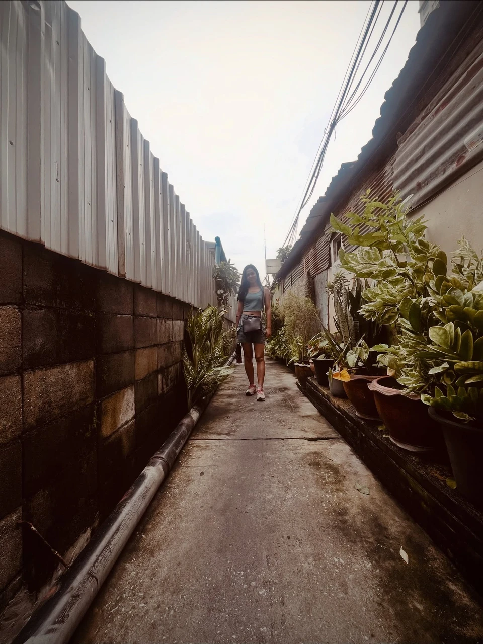 Photo 1 from Benjamin Simier’s Instagram post: Sometimes, just a short walk in Bangkok is enough to get lost in its small alleys. They’re full of life, often very different from what you see on the main road